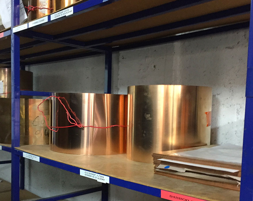 Brass coils stored in the workshop before processing
